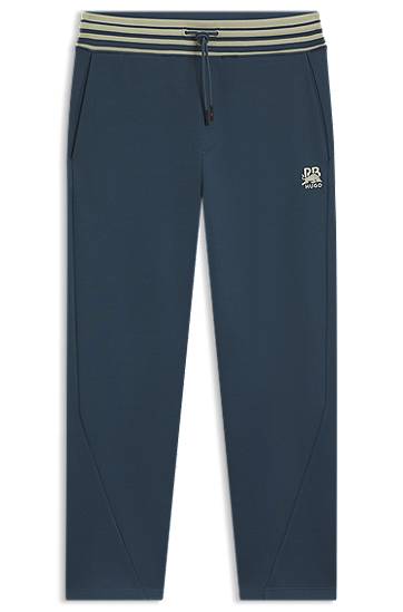Tepláky BOSS HUGO x RB Oversized-Fit Tracksuit Bottoms with Striped Waistband and Drawstring Navy | 50549308, 0