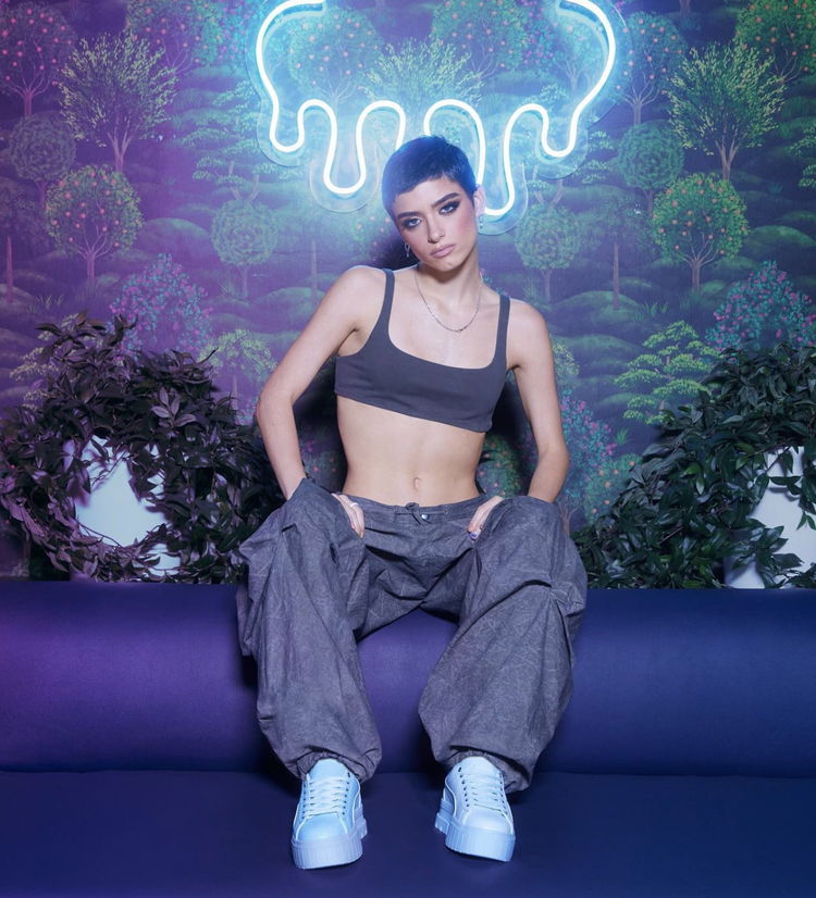 In Her Pumas
